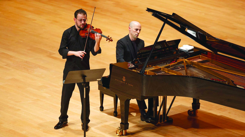 يامن سعدي وجوليان كوينتين على المسرح الأحمر